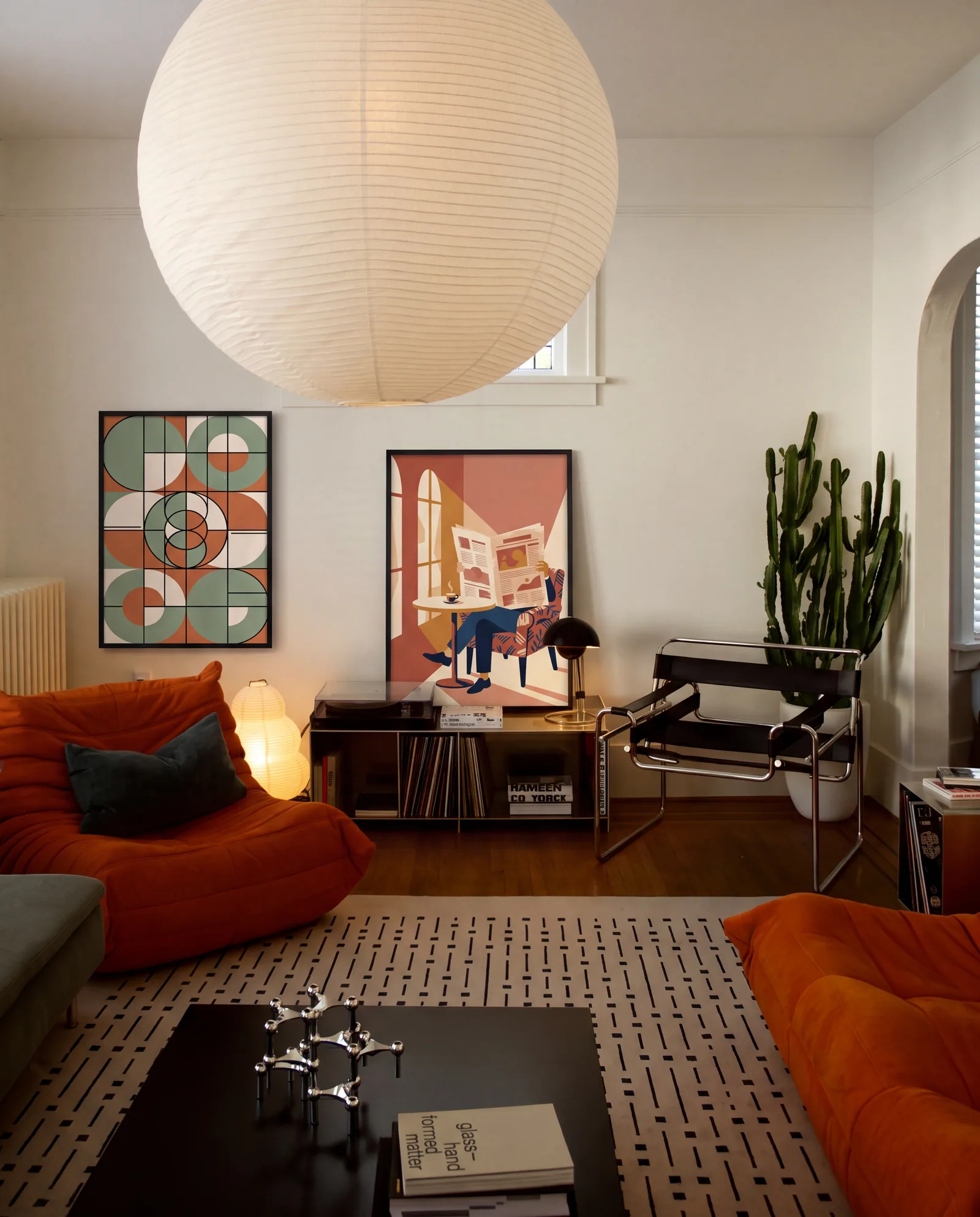 Styled room with Modular Circles Grid and Newspaper And Espresso